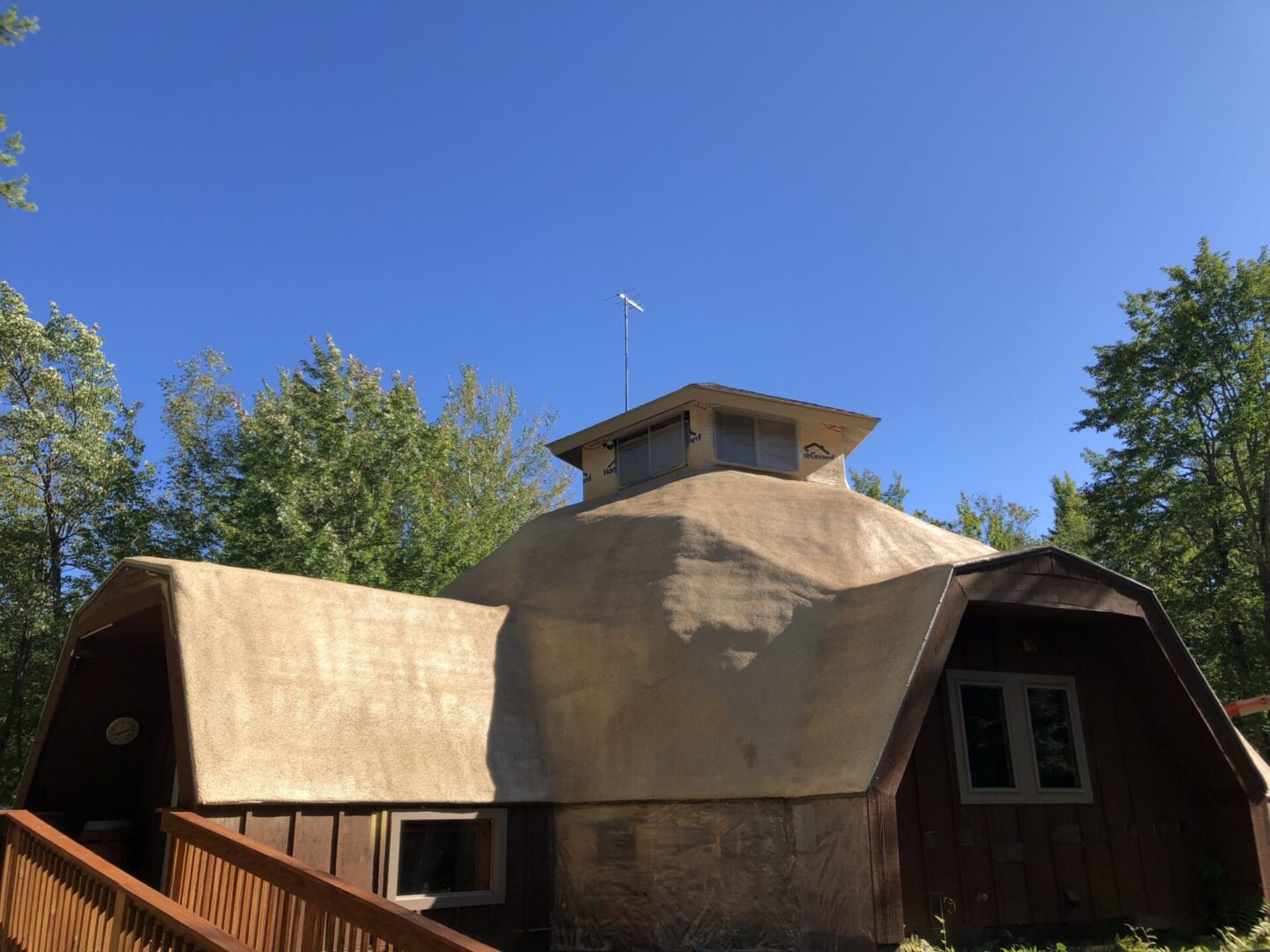 domed roof ceiling for better insulation seen in side view