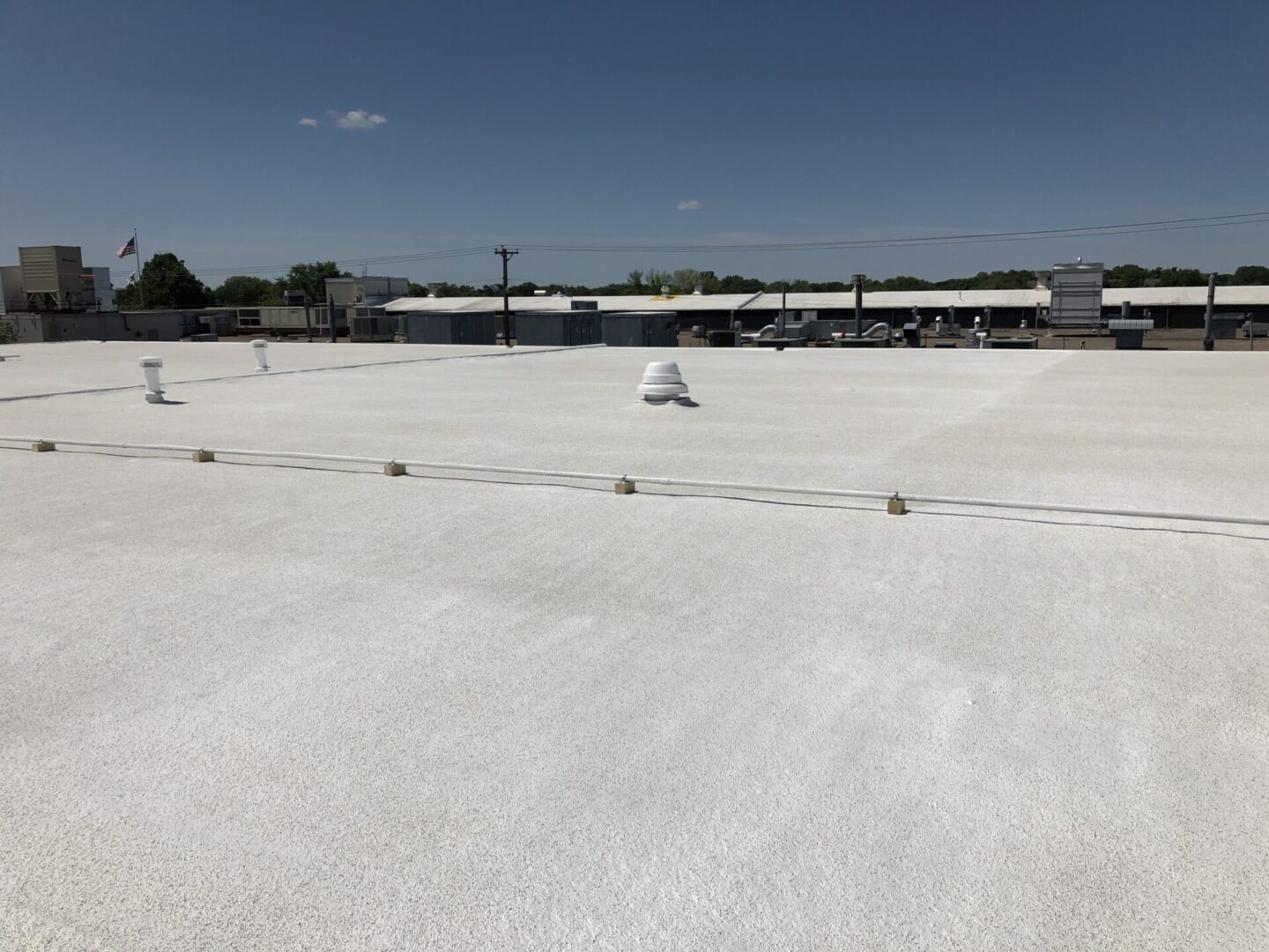 roof area with long-lasting spray insulation