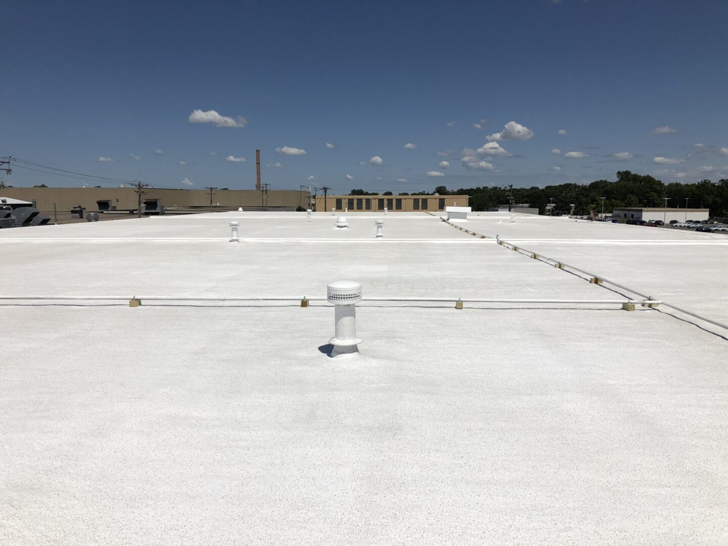 rooftop with long-lasting spray insulation