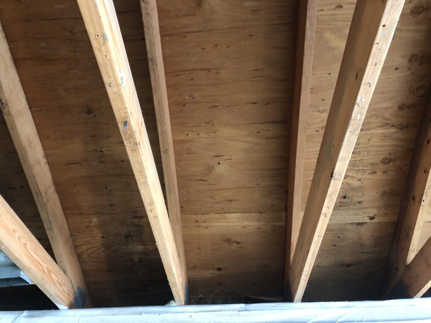 wooden beams on ceiling of construction