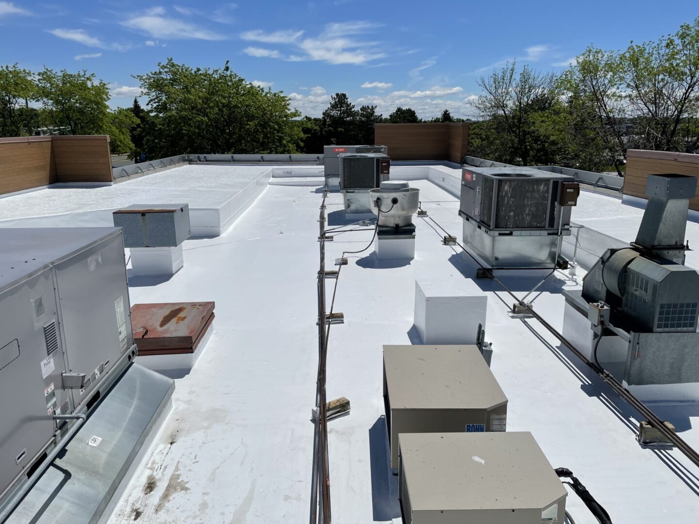 Industrial roof level with machines, vents, and insulation