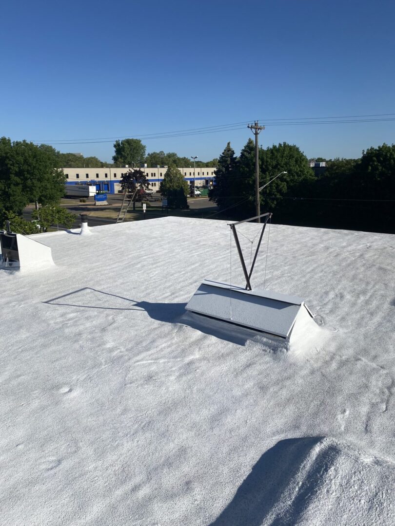 rooftop of building property with spray insulation